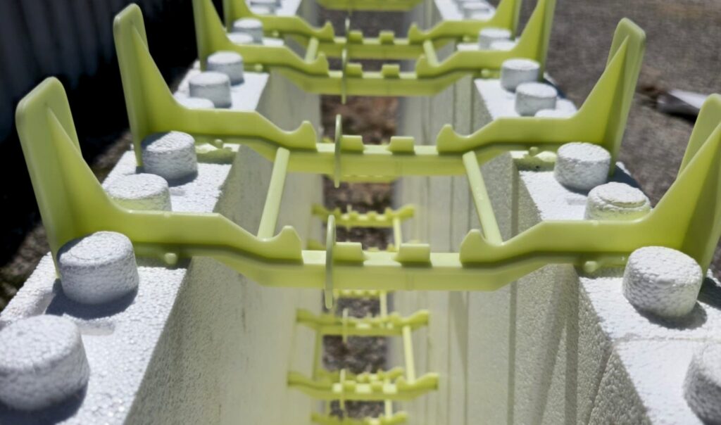 Stelcor ICF wall forms connected with reinforcing brackets